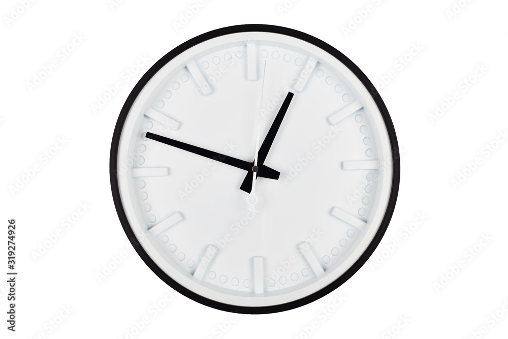 Wall clock with a white dial and black arrows isolated on a white background. Wall clock with a white dial and black arrows isolated on a white background.