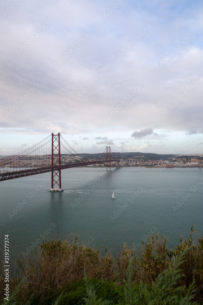 25 de Abril Bridge with Lisbon in the background