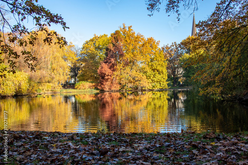 Autumnal view of a park landscape in the center of Leipzig,Saxony in Germany photo