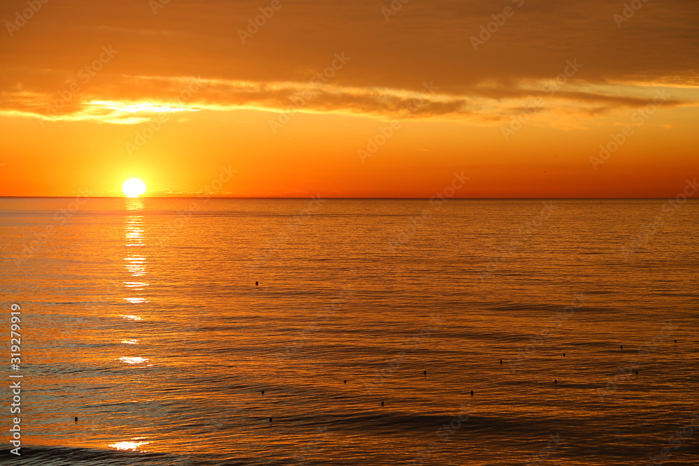 Amazing bright sunrise at the sea