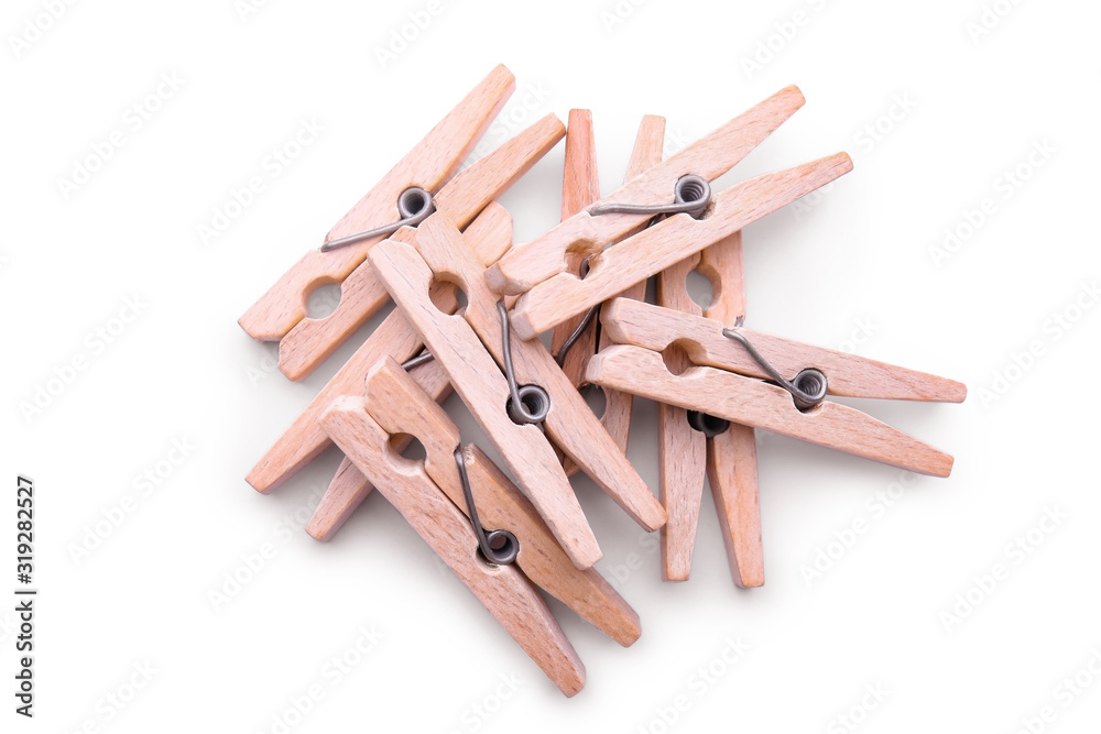 Wooden pegs isolated on white background. Zero waste alternative for plastic pins. Eco friendly concept Wooden pegs isolated on white background. Zero waste alternative for plastic pins. Eco friendly concept