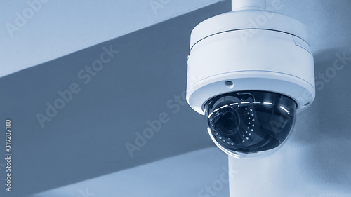 A review of surveillance cameras on white background. Security concept. Facial recognition. Program search for criminals. photo
