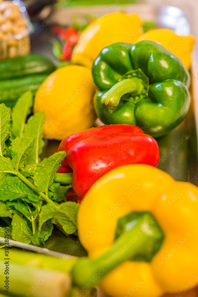 Well presented colorful mix of fresh yellow, red and green paprika Well presented colorful mix of fresh yellow, red and green paprika