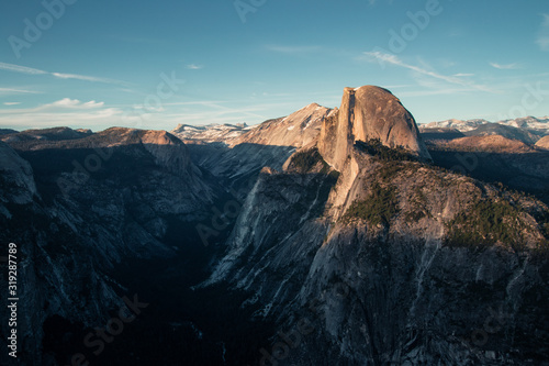 Last light of the day in the Yosemite Valley. Beautiful sunset over the Half Dome in one of the most gorgeous national parks of USA in California