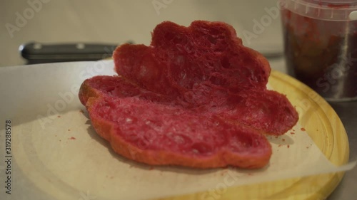 Croissant decoration with icing sugar and raspberry jam. Sweet dessert