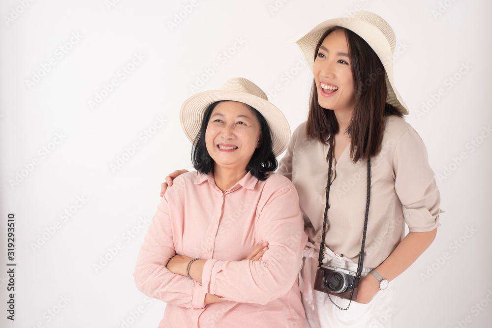 Asian older woman and her daughter on white background, Travel concept Asian older woman and her daughter on white background, Travel concept