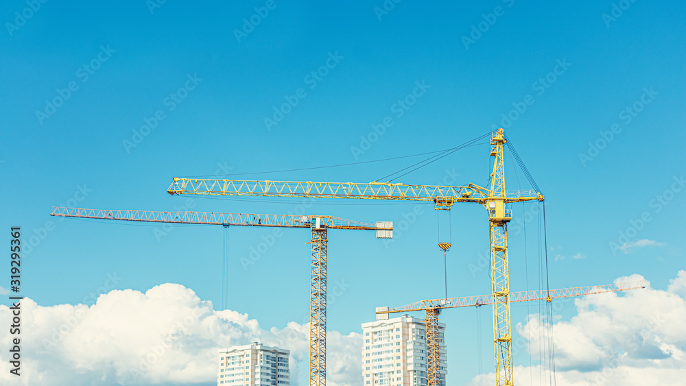 Sunny day, blu sky, three construction of an apartment building, copy space Sunny day, blu sky, three construction of an apartment building, copy space