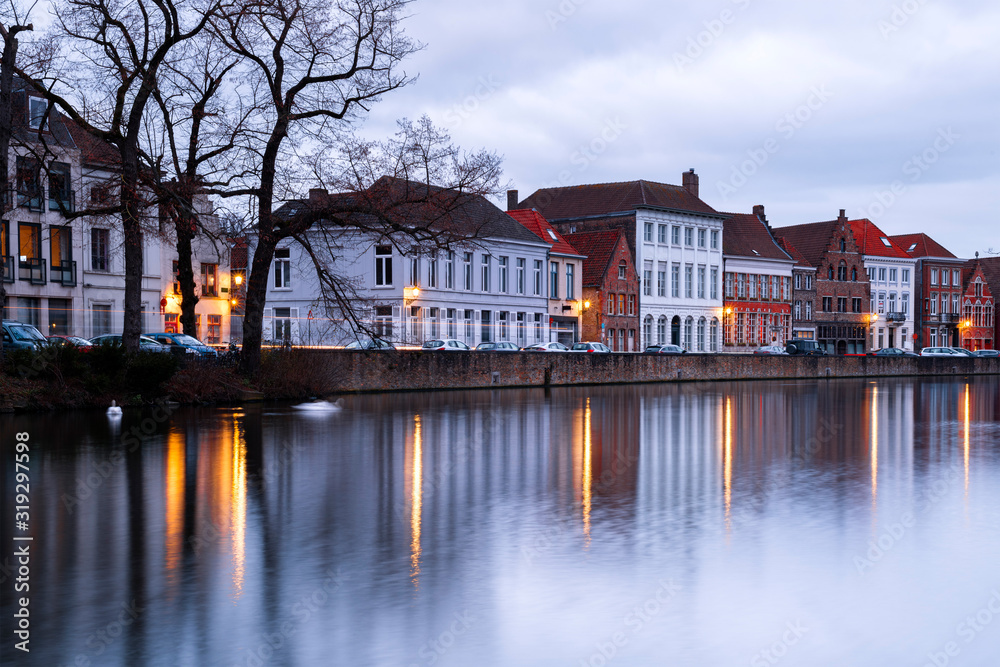 Buildings in Bruges (Belgium) reflecting in the Water