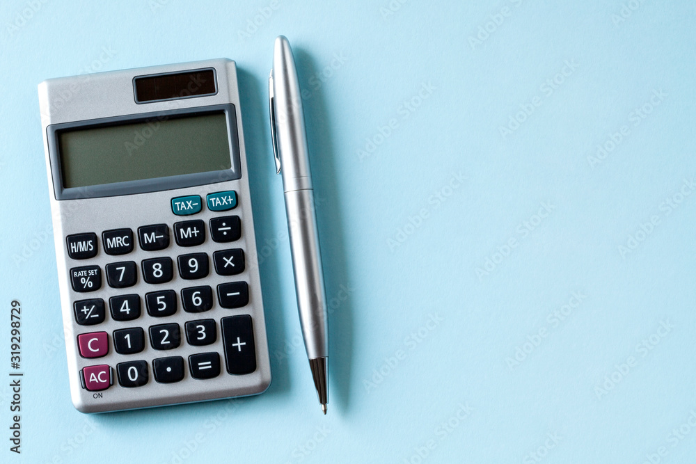 calculator and pen isolated on white background calculator and pen isolated on white background