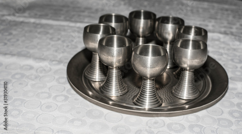 Quadro su tela pewter wine goblets an a tray