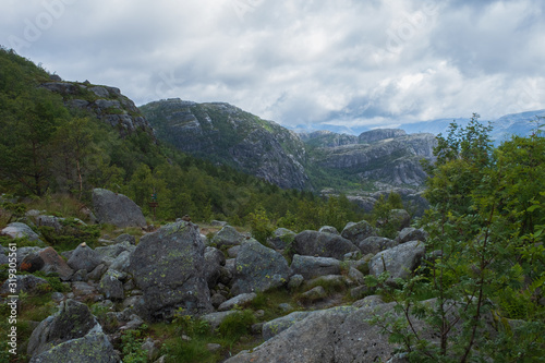 Mountains on the way to the Preachers Pulpit Rock in fjord Lysefjord - Norway - nature and travel background. Lake Tjodnane, july 2019