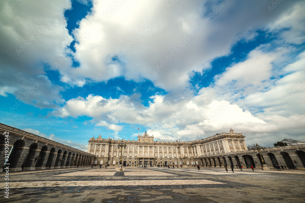 Royal Palace in Madrid under a cloudy sky