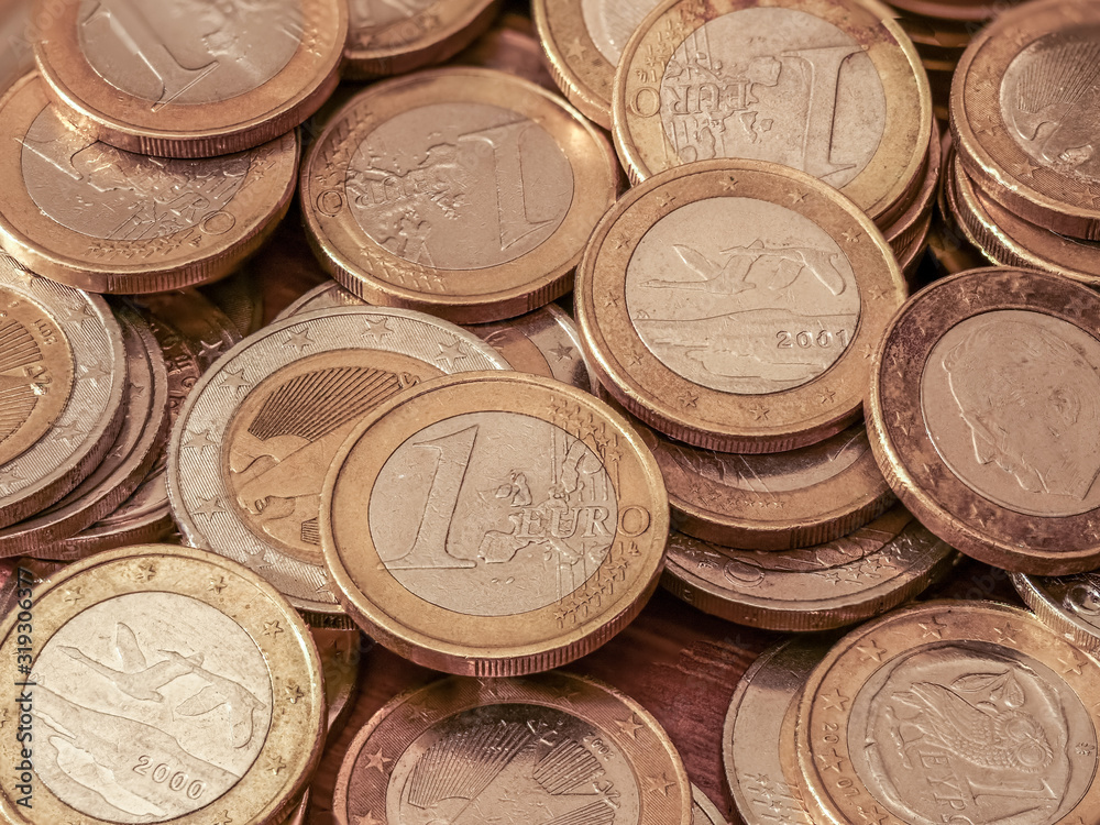 Close-up image of one and two Euro coins Close-up image of one and two Euro coins