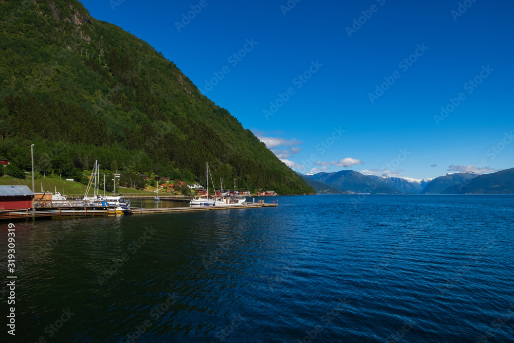 Vik, Norway - july, 2019: Vik port, Vik is a municipality in Sogn og Fjordane county. It is located on the southern shore of the Sognefjorden in the traditional district of Sogn.