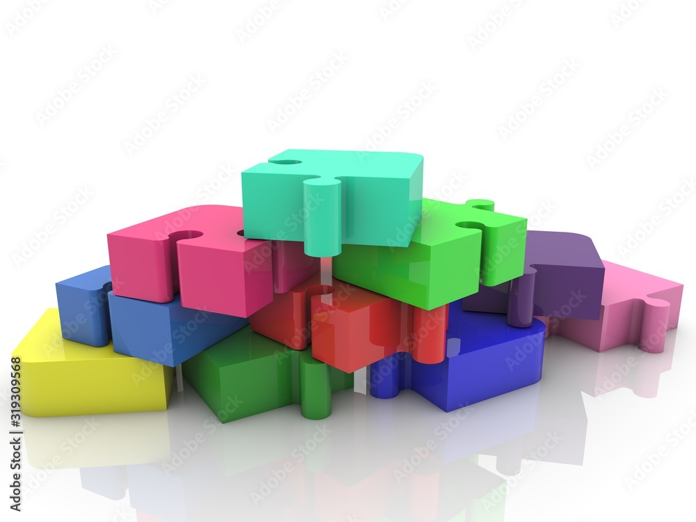 Colored pieces of a puzzle stacked on top of each other Colored pieces of a puzzle stacked on top of each other
