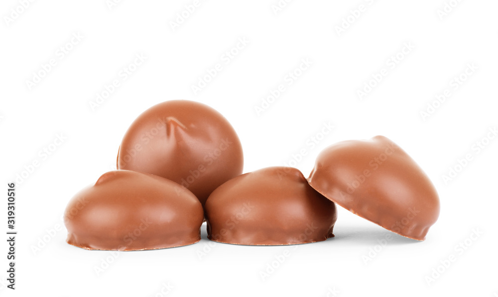 chocolate covered marshmallows, part of one bitten off, isolated on white background chocolate covered marshmallows, part of one bitten off, isolated on white background