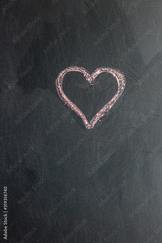 Heart painted on black chalk board.. Valentine's Day Heart painted on black chalk board.. Valentine's Day