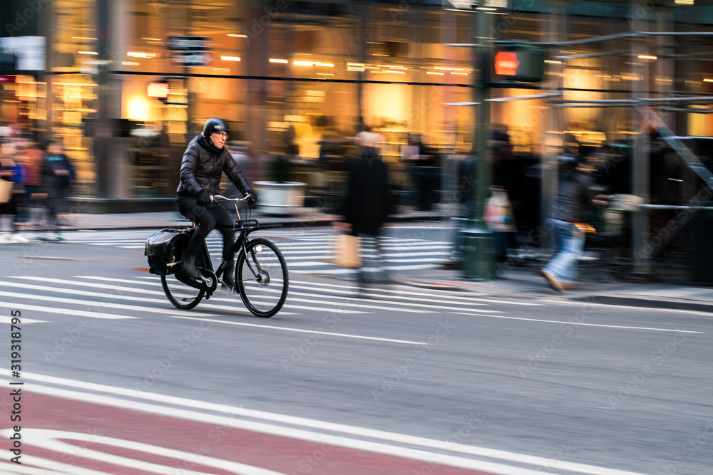 Bike Rider in New York City, going fast