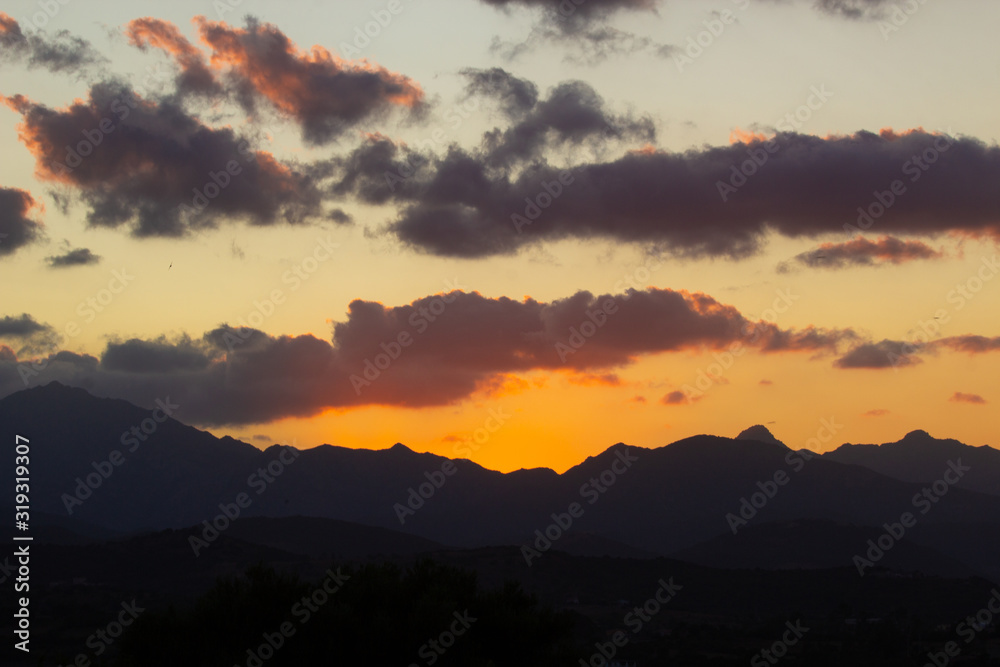 Fototapeta premium beautiful sunset sky over mountains on Sardinia