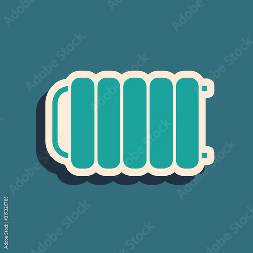 Green Heating radiator icon isolated on blue background. Long shadow style. Vector Illustration