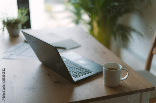 laptop and coffe on nice desk photo