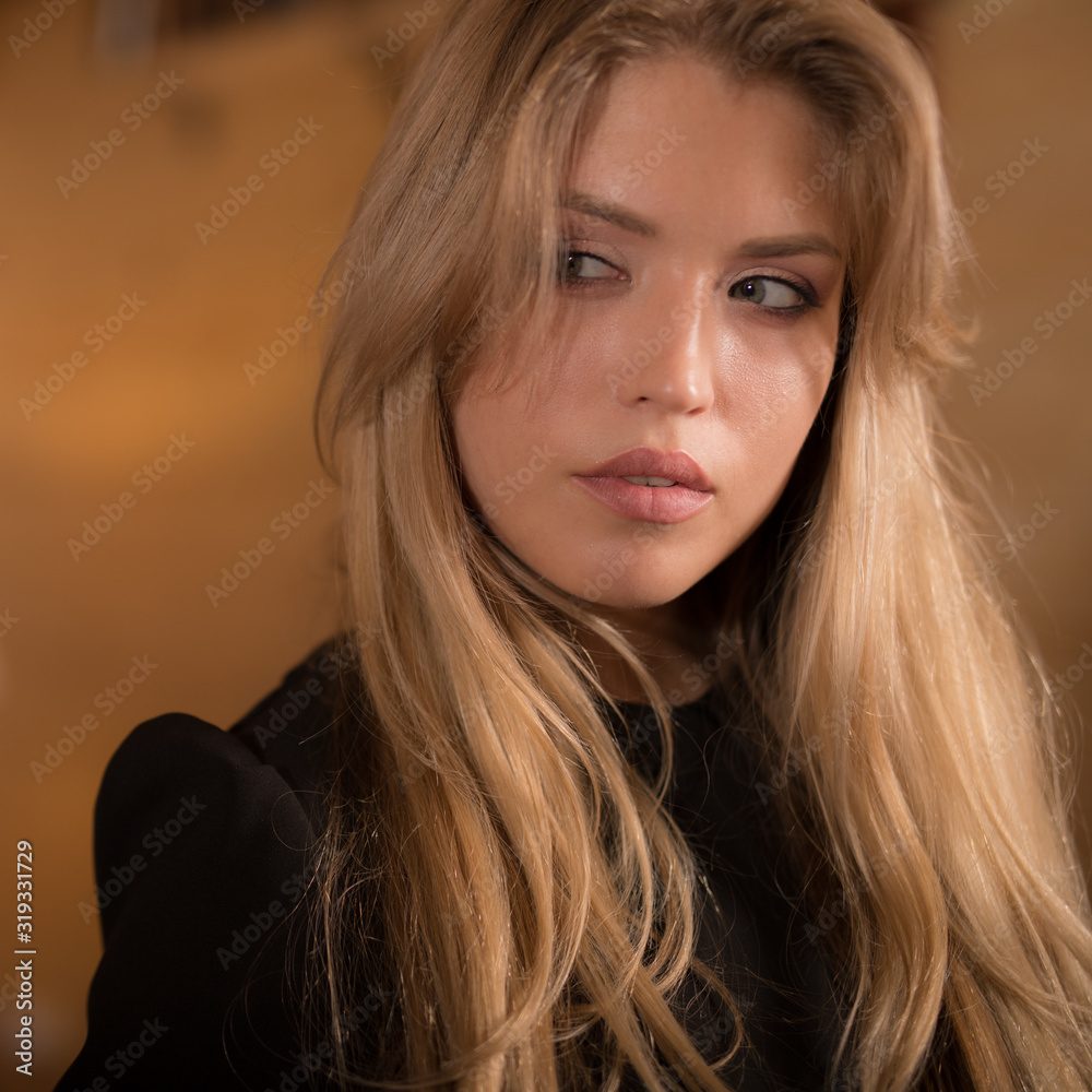 Young beautiful stylish girl in modern interior. Young beautiful stylish girl in modern interior.