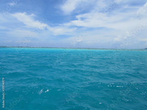 Tahiti beautiful Azul water and blue sky