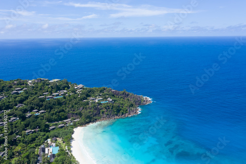 Aerial view of mahe Island, Seychelles Drone view of Anse Petite bay © NEWTRAVELDREAMS
