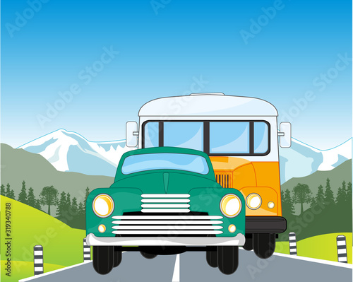 Retro car and bus on mountain road