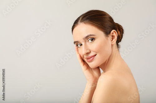 Beautiful young woman with ...