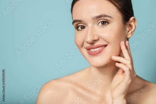 Beautiful young woman with ...