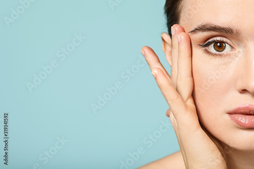 Beautiful young woman with ...