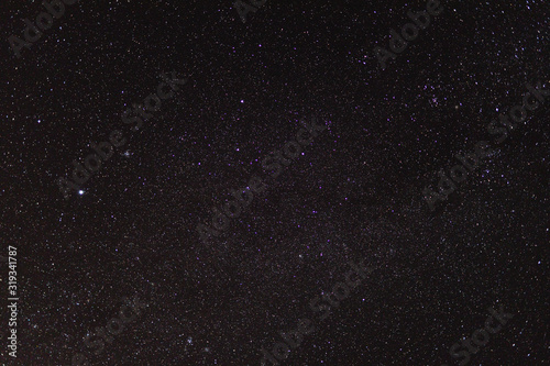starry night sky with extremely clear conditions making a lot of constellations visible as well as some meteors or satellite trails shot from Tasmania