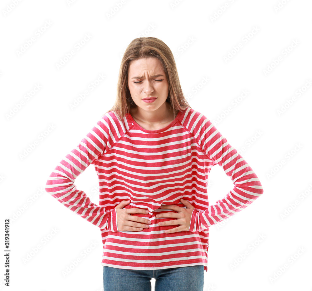 Young woman suffering from stomachache on white background Young woman suffering from stomachache on white background