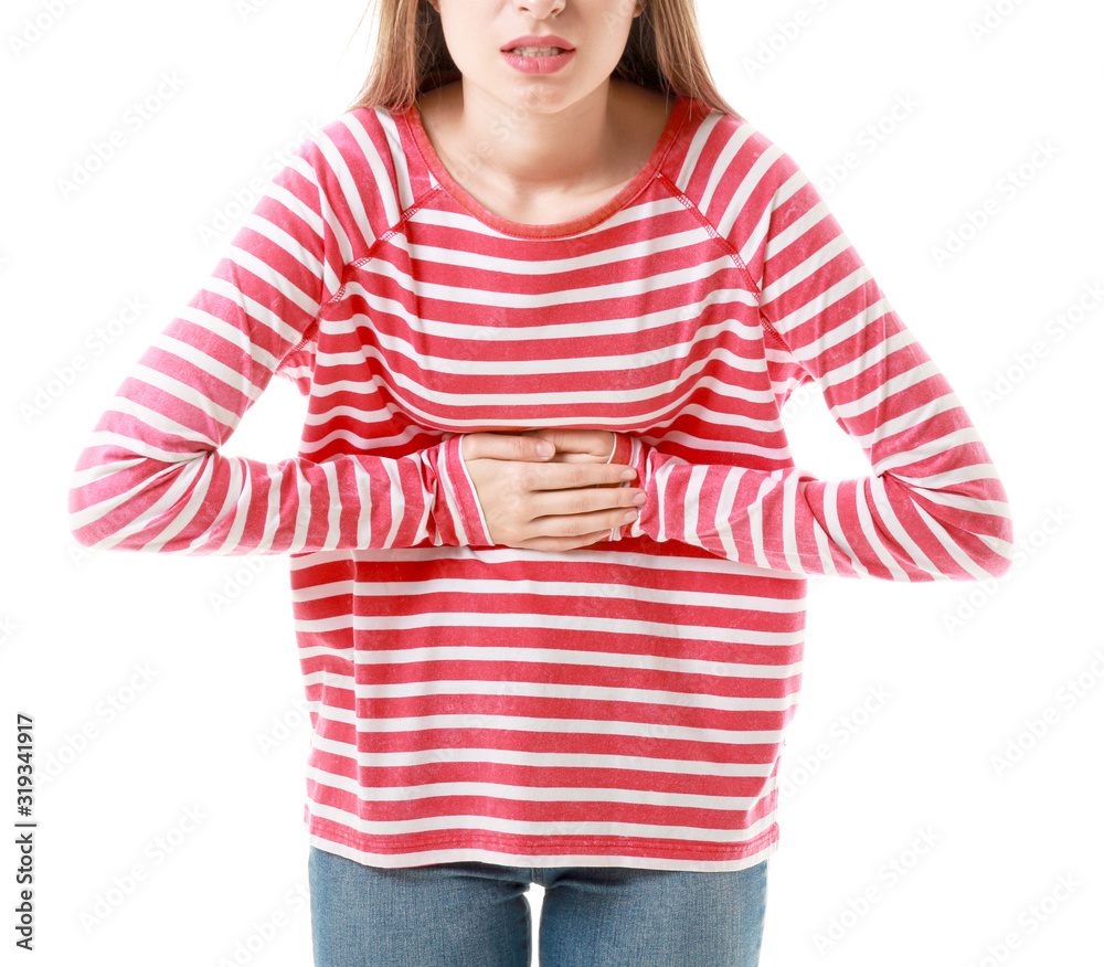 Young woman suffering from stomachache on white background Young woman suffering from stomachache on white background