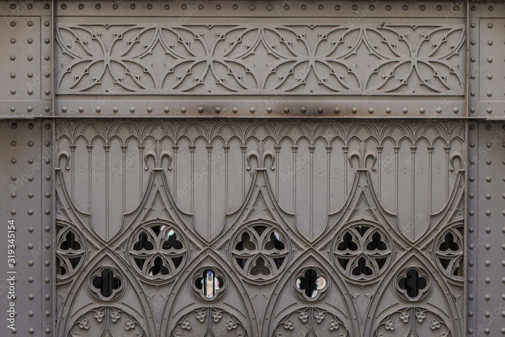 The gothic ajury pattern of dark old metal. Portugal.