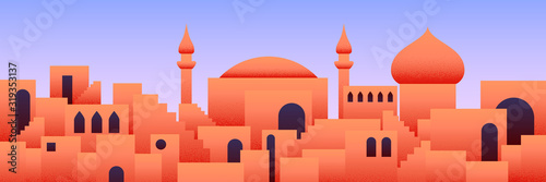 Fototapeta Arabic city panorama in orange desert color with mosque silhouettes
