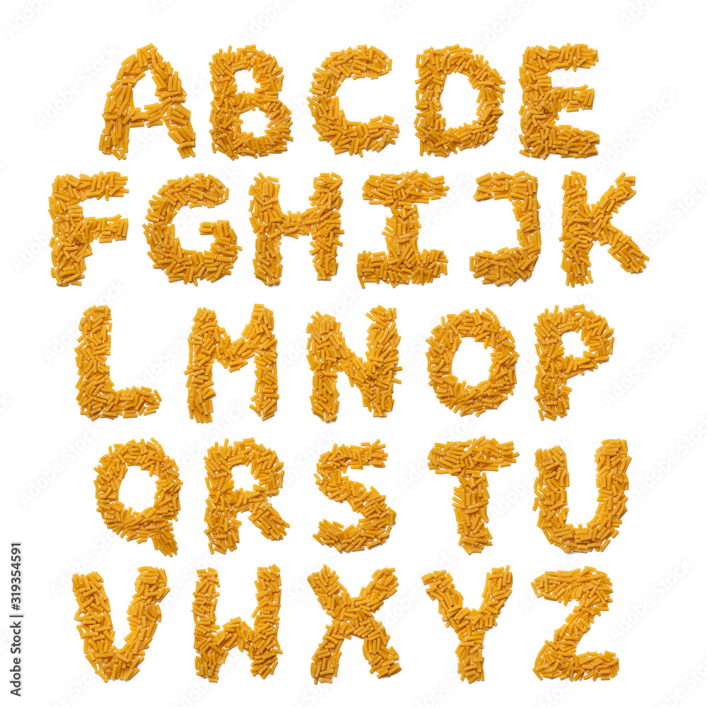 English alphabet from dry pasta on a white isolated background. Food pattern made from macaroni tubes. Bright alphabet for shops.