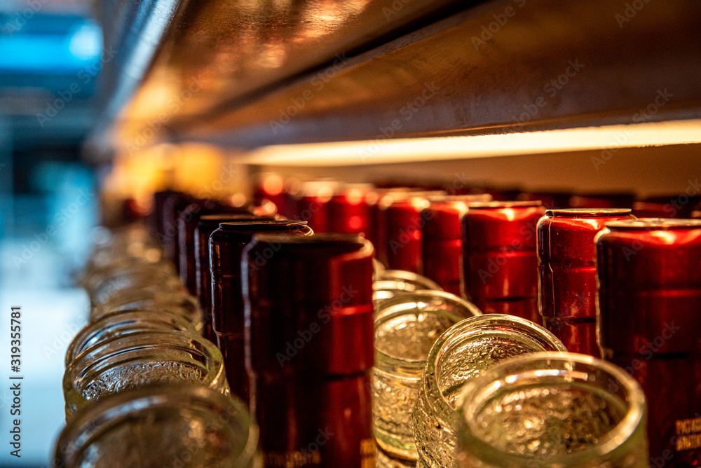 Perspective view of bokeh of liquor bottles in a shop. Perspective view of bokeh of liquor bottles in a shop.