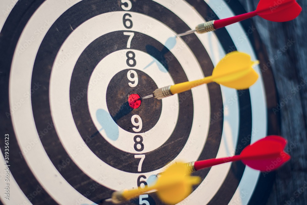 darts arrows in the target center. business target concept. darts arrows in the target center. business target concept.