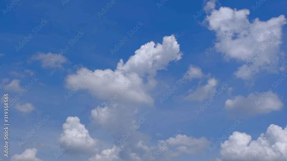 Stock 4k: Time lapse, timelapse video of clear blue sky white fluffy clouds. Royalty high-quality free stock time lapse footage of blue sky and white cloud. Time lapse of natural cloudscape background