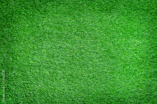 Artificial grass texture patter abstract background from top view.