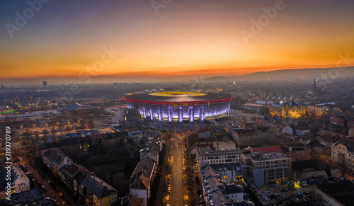 Budapest  Hungary - Aerial high resolution panoramic shot of Budapest at dusk with a beautiful golden sunset and Puskas Ferenc Stadium aka Puskas Arena