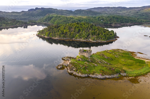 Aerial drone shot of Castle Tioram, Scottish Highlands.