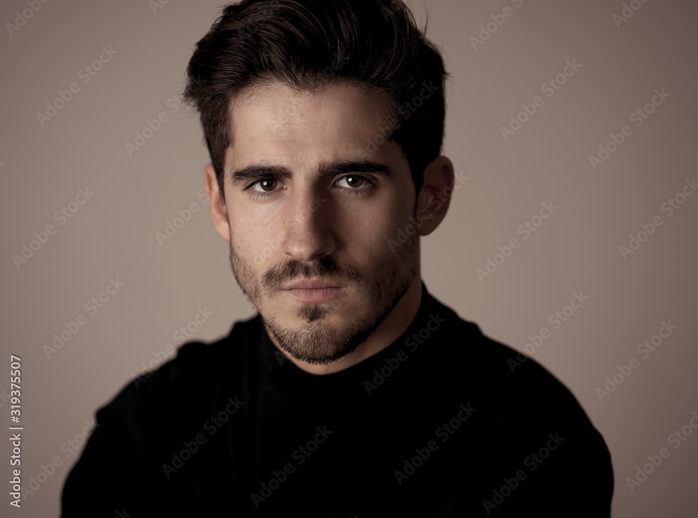 Young attractive latin man posing looking sensual and handsome. Beauty concept and lifestyle