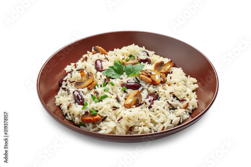 Delicious rice pilaf with mushrooms isolated on white