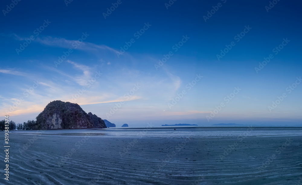 view seaside morning on the beach with cloudy and blue sky background, morning at Chao Mai Beach, Had Chao Mai National Park, Trang province, southern of Thailand.