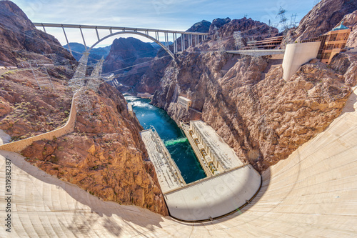 View from Hoover Dam over Colorado river with Mike O'Callaghan–Pat Tillman Memorial Bridge in the evening
