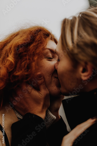 Canvastavla Love. Close up portrait of young happy couple kissing