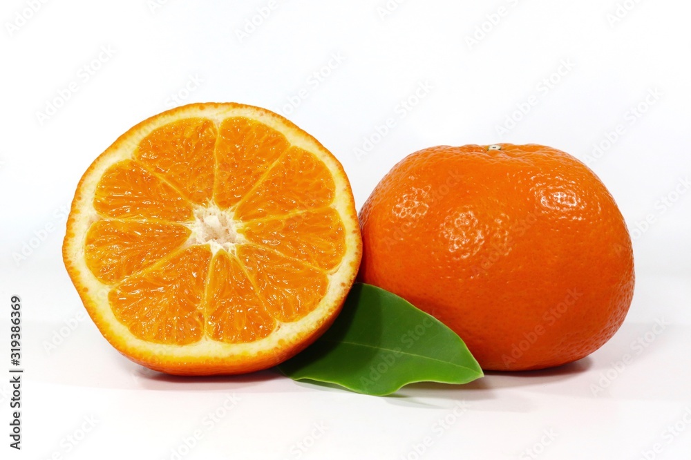 slice orange with leaf on white background slice orange with leaf on white background